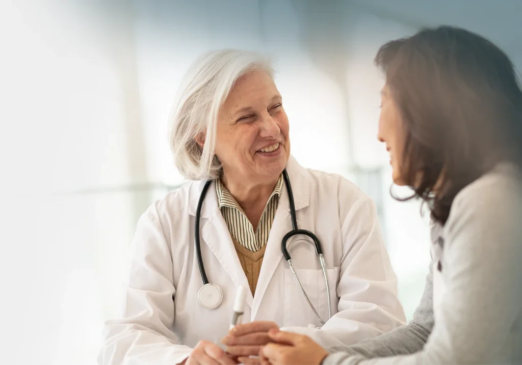 Doctor speaking with patient